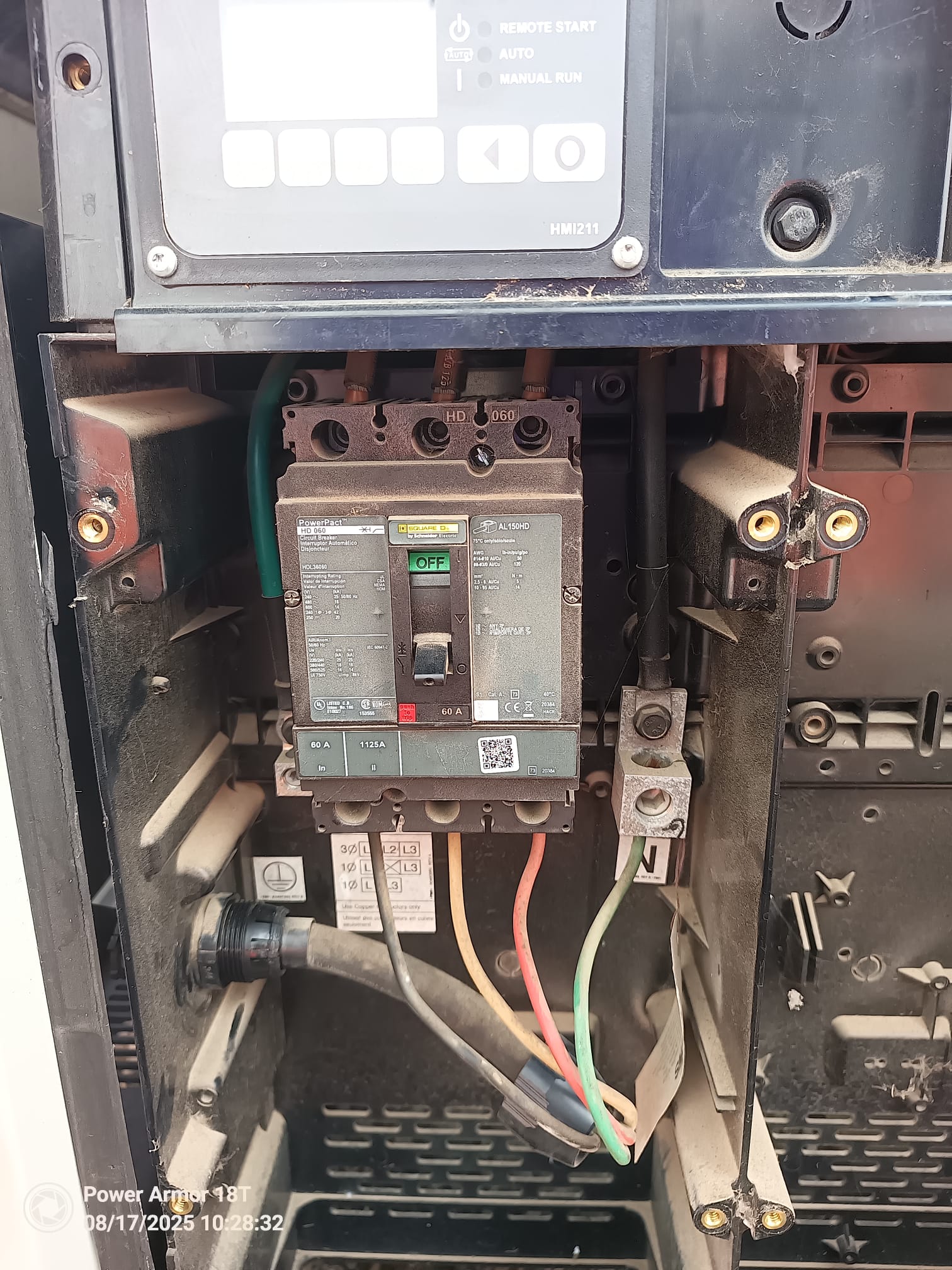 Close-up of the generator circuit breaker and connected conductors