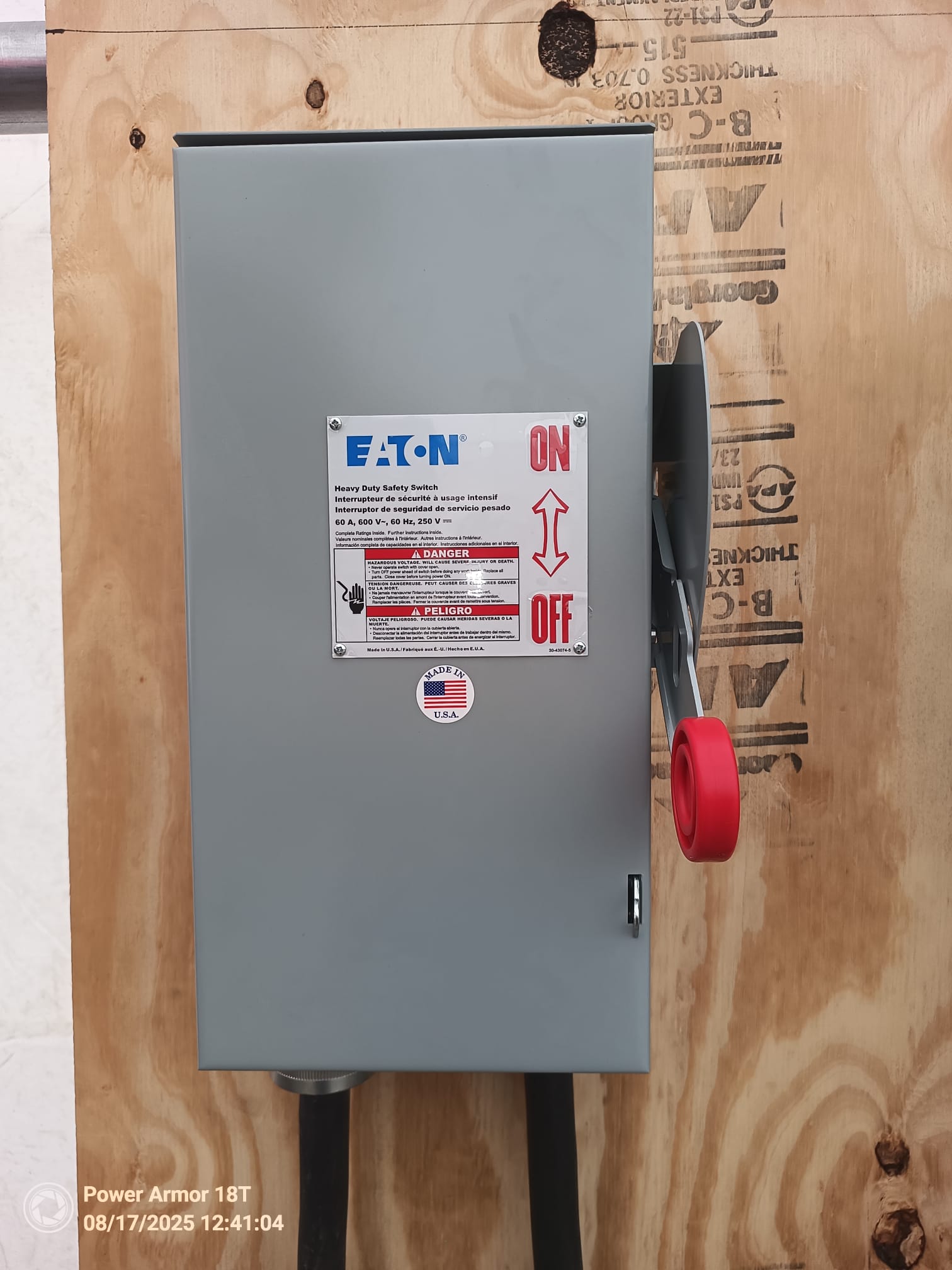 Eaton fused safety disconnect with its cover closed and connected cables